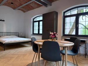 Giường trong phòng chung tại Apartamenty Parkowa