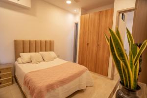 Ένα ή περισσότερα κρεβάτια σε δωμάτιο στο Casa Chongui