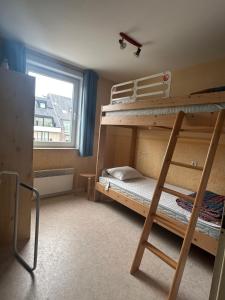 En eller flere senge i et værelse på Panorama Sud