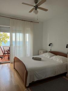 Posteľ alebo postele v izbe v ubytovaní Apartments Karaman