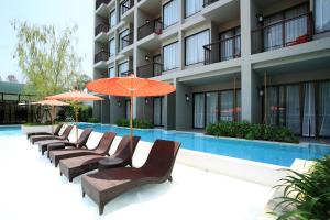 Bazén v ubytování Proud Phuket, Naiyang Beach nebo v jeho okolí