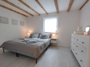 Postel nebo postele na pokoji v ubytování Ferienhaus Marion