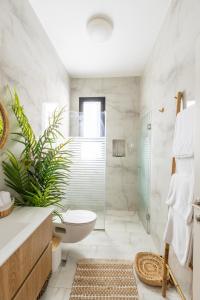 Koupelna v ubytování טל תאי בוטיק - Tal Thai Boutique + 26 fotografií