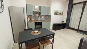 Kuchyňa alebo kuchynka v ubytovaní Gelsonero Apartments + 4 fotografie