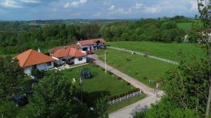 an aerial view of a house with a yard at Kuća za odmor Vasiljević in Ljig