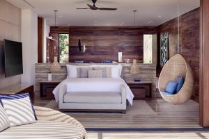 Postel nebo postele na pokoji v ubytování Zadún, a Ritz-Carlton Reserve, Los Cabos