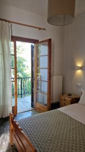 Postel nebo postele na pokoji v ubytování Holiday Home Neochori Pelion
