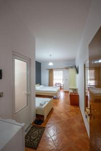 Katil atau katil-katil dalam bilik di Classic Rooms