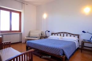 Ένα ή περισσότερα κρεβάτια σε δωμάτιο στο Villa Sibilla +65 φωτογραφίες