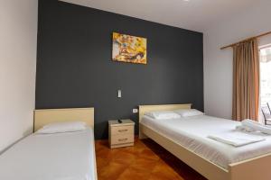 Katil atau katil-katil dalam bilik di Classic Rooms