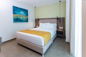 Postel nebo postele na pokoji v ubytování Hotel Zi One Luxury
