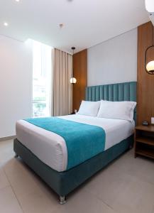 Postel nebo postele na pokoji v ubytování Hotel Zi One Luxury