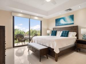 Una cama o camas en una habitación de Carao T1-2 Luxury Apartment- Reserva Conchal