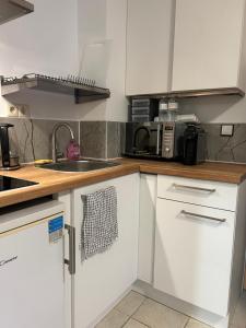 Chambre double à Niederkorn 주방 또는 간이 주방