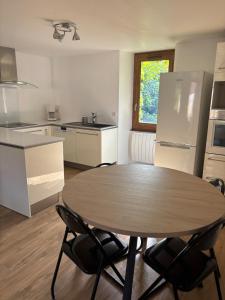 Kuchyň nebo kuchyňský kout v ubytování La Maison du Ruisseau