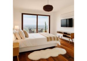TV/trung tâm giải trí tại Casa Mirador, Lujo con vista infinita