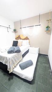 Postel nebo postele na pokoji v ubytování UKU INN