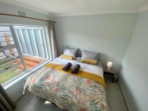 Postel nebo postele na pokoji v ubytování In Harmony - Pet Friendly Modern Beach House