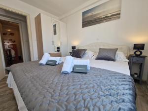 Postel nebo postele na pokoji v ubytování Apartments MB