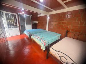 Katil atau katil-katil dalam bilik di Habitacion Independiente 1 Vereda La Trina Libano Tolima