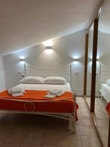 En eller flere senge i et værelse på MARCONI APARTMENTS