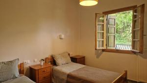 Postel nebo postele na pokoji v ubytování Holiday Home Neochori Pelion