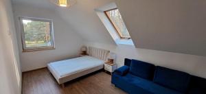 Fotografie z fotogalerie ubytování Luksusowy dom w sosnowym lesie v destinaci Płaska