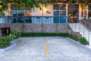 a parking lot in front of a building at Hotel Zi One Luxury in Cartagena de Indias