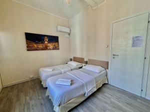 Postel nebo postele na pokoji v ubytování Maison Sarraj