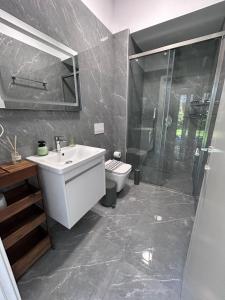 Bagno di OLEA Family Apt with Garden
