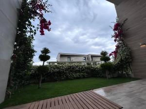 Giardino di OLEA Family Apt with Garden
