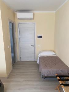 Posteľ alebo postele v izbe v ubytovaní Residence B&B il Connubio