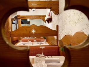 a view of a dining room with tables and chairs at Locanda Antica Bribano in Sedico