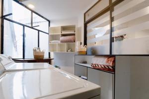 Kuchnia lub aneks kuchenny w obiekcie Sky Loft a 3 cuadras de la UTPL 5min del centro
