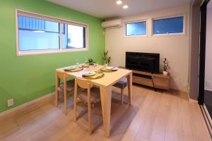 TV a/nebo společenská místnost v ubytování Luce Stay&Resort Evoluto101