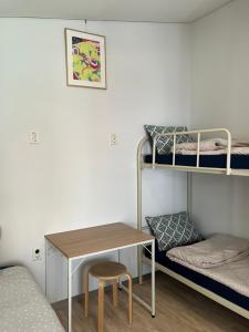 Postel nebo postele na pokoji v ubytování Inside Busan Hostel