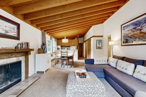 a living room with a couch and a fireplace at Sun Valley Serenity in Sun Valley