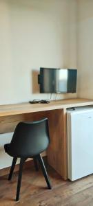 TV a/nebo společenská místnost v ubytování Duka Rooms