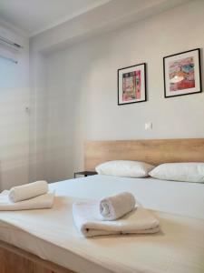 Postel nebo postele na pokoji v ubytování Duka Rooms