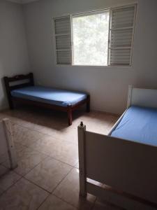 Postel nebo postele na pokoji v ubytování Chácara Balalaika em Cabreúva