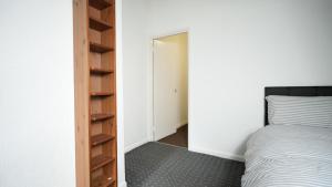 Postel nebo postele na pokoji v ubytování 1 Bed Apartments - Oakroyd Villas