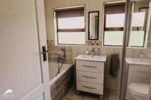 Koupelna v ubytování Aloe Corner, Cathkin Estates by Euphoric Leisure + 23 fotografií