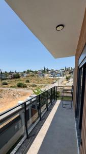 a balcony of a building with a view of the beach at Villa Lea - 4 km to the sea 9 km to the airport in Antalya