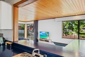 a kitchen with a sink and a counter top at 43 Conical Hill Road in Hanmer Springs