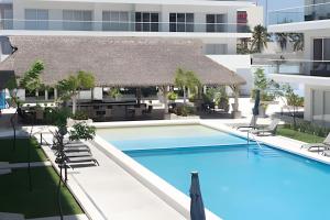 La alberca dentro o cerca de Refugio marino, alberca y playa