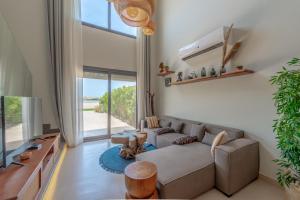 Posezení v ubytování Charming Jungle Home