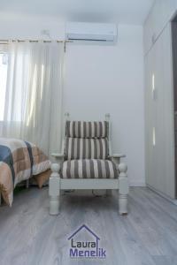 En eller flere senge i et værelse på Casa Thorne