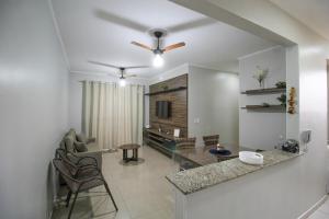 Μια τηλεόραση ή/και κέντρο ψυχαγωγίας στο Apartamento em Olimpia - SP