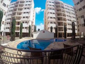 Πισίνα στο ή κοντά στο Apartamento em Olimpia - SP