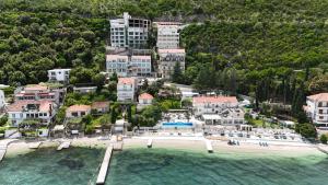 an aerial view of a resort on the water at Bellanti in Herceg-Novi